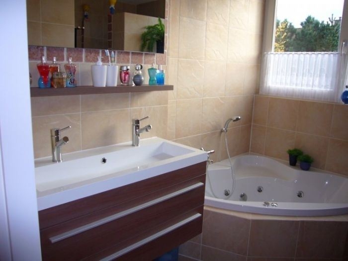 Aannemingsbedrijf-Oskam-keukenrenovatie-badkamerrenovatie-installeren-wasmeubel-bad-en-tegelwerken-badkamer
